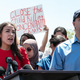 Rep. Alexandria Ocasio-Cortez (D-N.Y.), appearing next to Rep. Joaquin Castro (D-Texas), addresses the media after touring a border patrol facility housing children on July 1, 2019, in Clint, Texas.